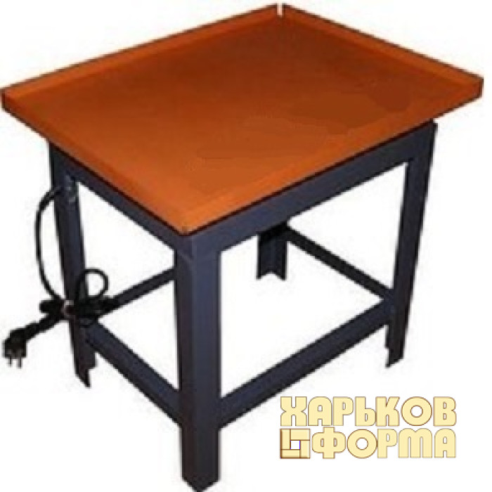 Vibrating table for paving slabs