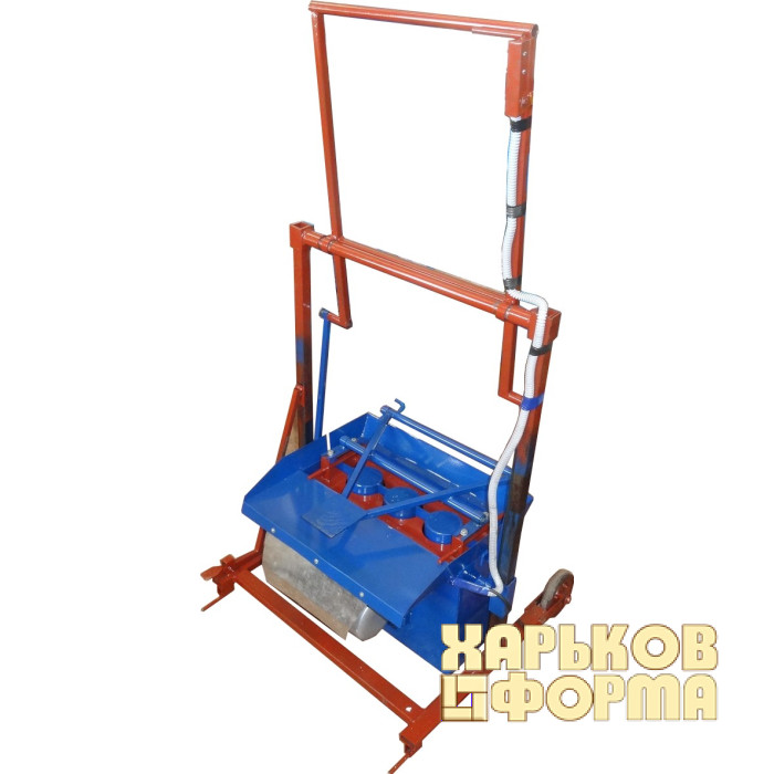 Machine for the production of wood concrete blocks